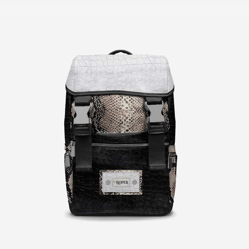 PROPER Signature Backpack in BLACK CROC, front view: black croc-textured body, white croc-textured flap, snake-textured panel and silver-tone buckles